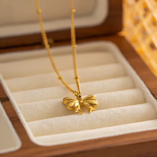 Gold Bow Charm Necklace