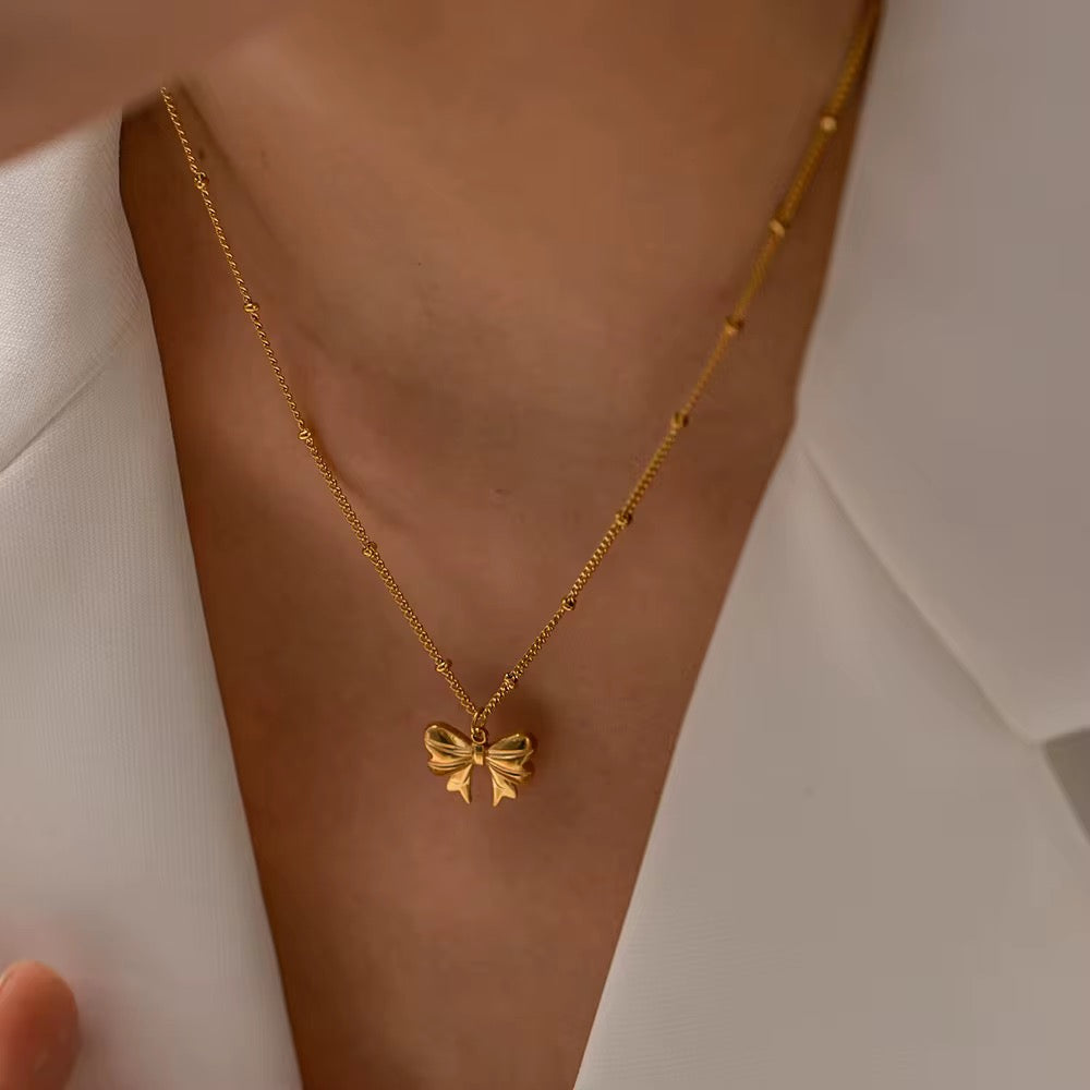 Gold Bow Charm Necklace