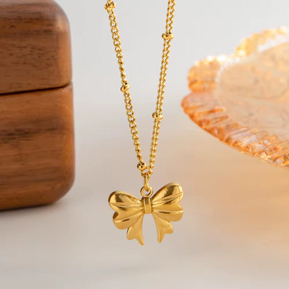 Gold Bow Charm Necklace