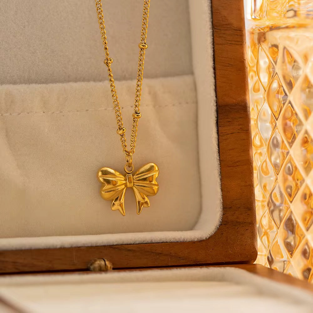 Gold Bow Charm Necklace